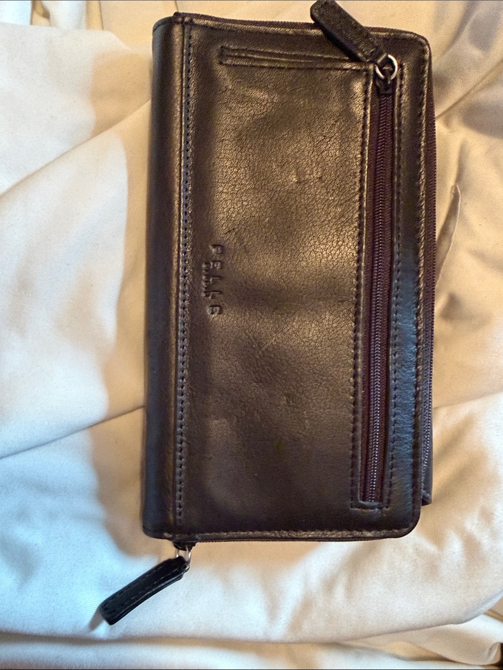 Wilsons leather PELLE black leather  zip-around wallet with front zip pocket